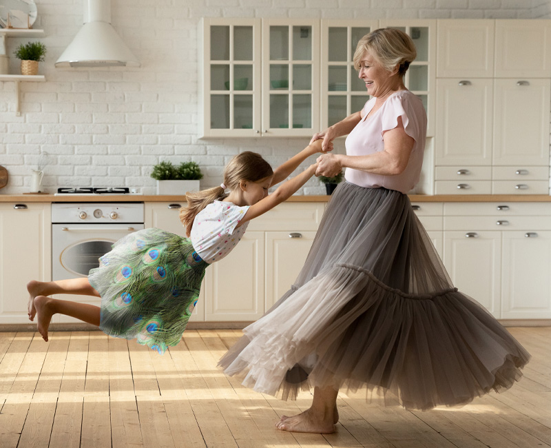 Grandmother and kid playing}