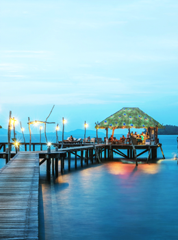 Beach bungalow at night