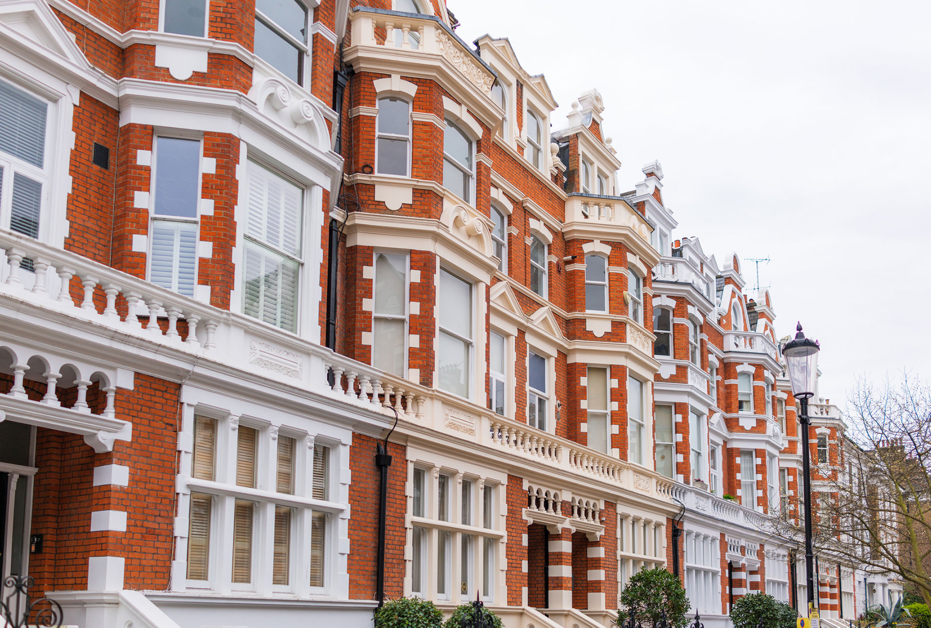 A street made up of brick-built apartments and townhouses in South Kensington, London