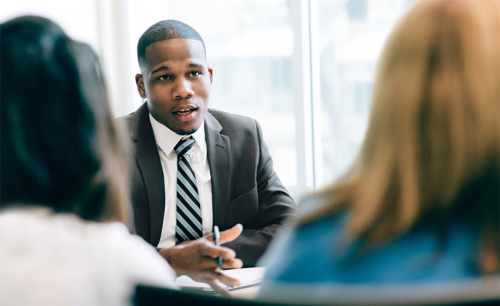 Two women having a meeting with their financial adviser