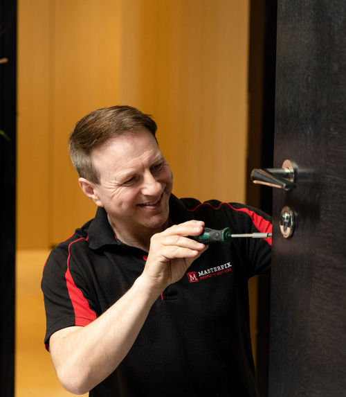 Man fixing door