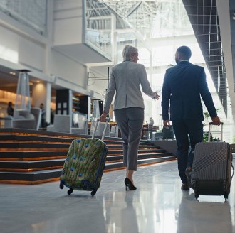 Business professionals in hotel lobby
