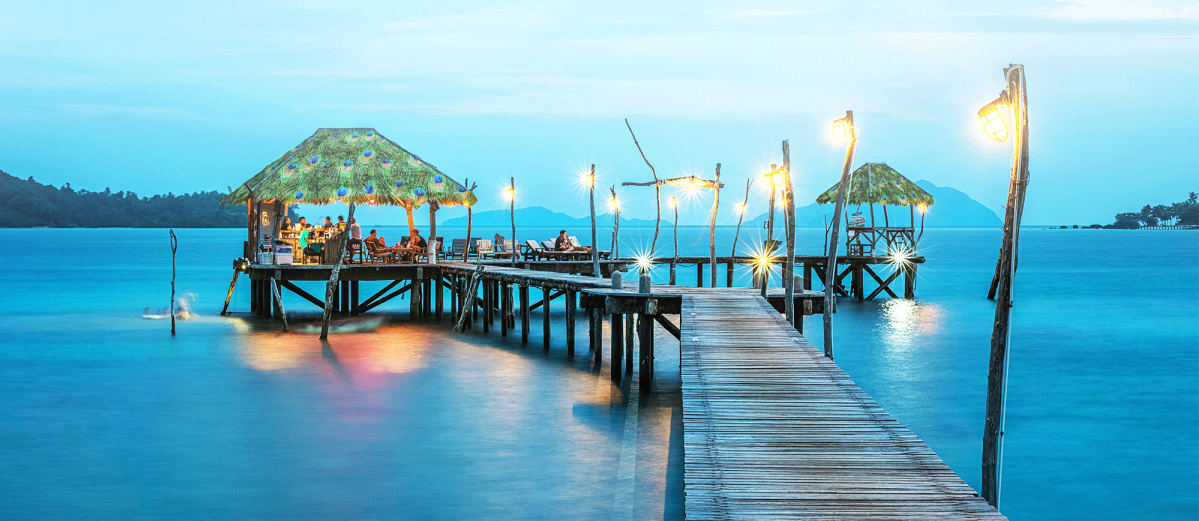 Beach bungalow at night