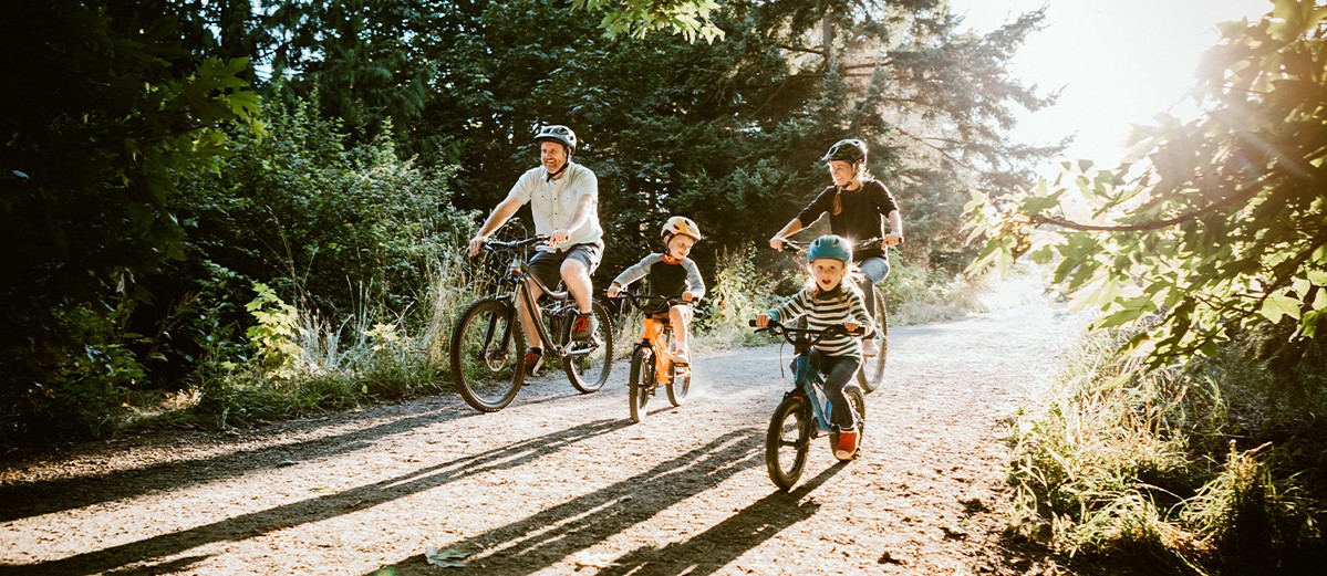 Family cycling outdoors