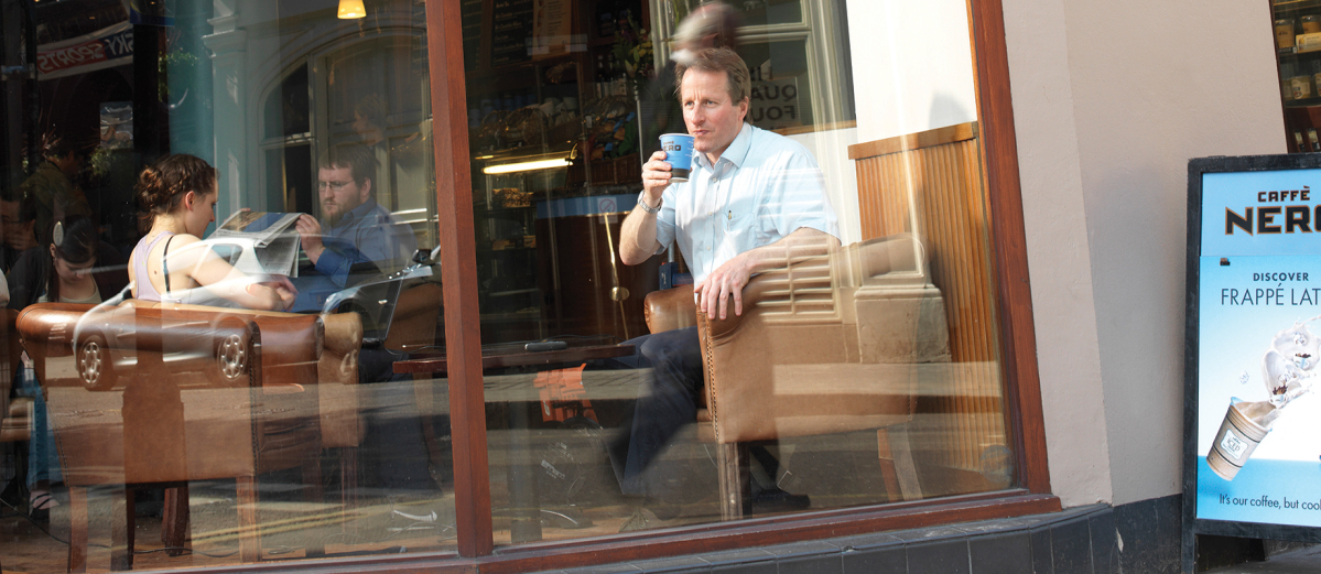 Paul Ettinger sitting in Caffè Nero