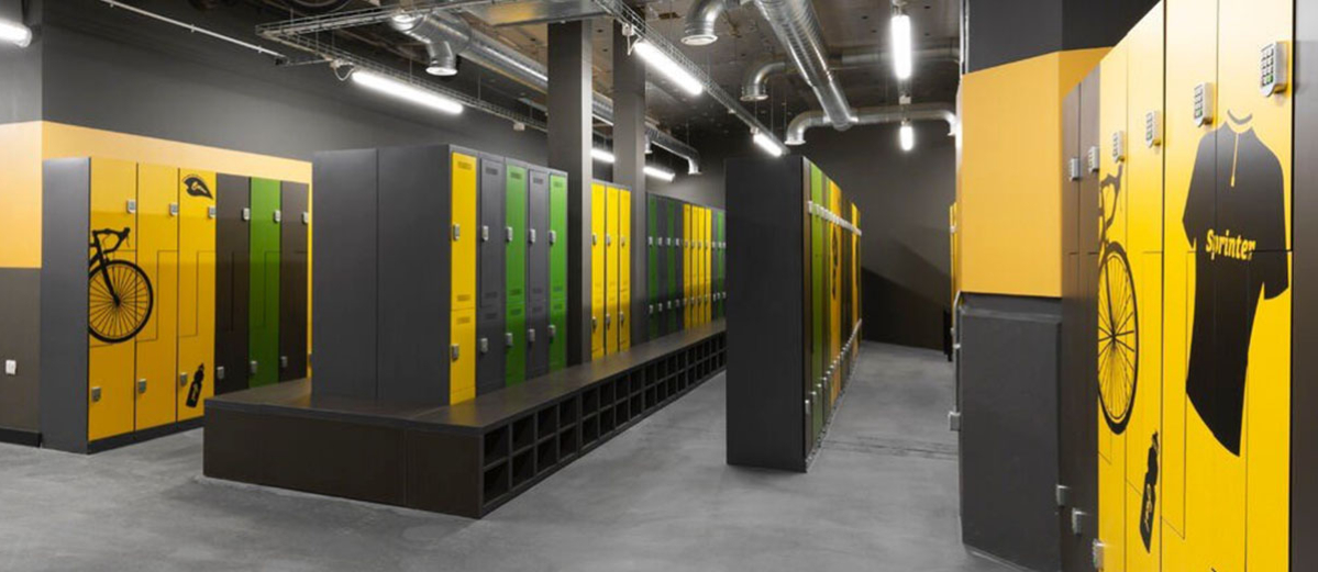 Lockers in a a changing room printed with bike graphics