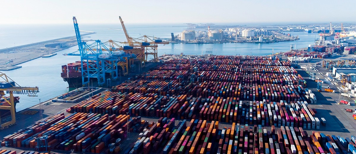 Aerial view of shipping containers and cargo ships in the sea port of Barcelona in Spain, Europe