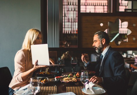 Business professionals having a meeting in a restaurant