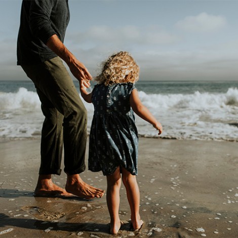 Father and daughter at a beach
