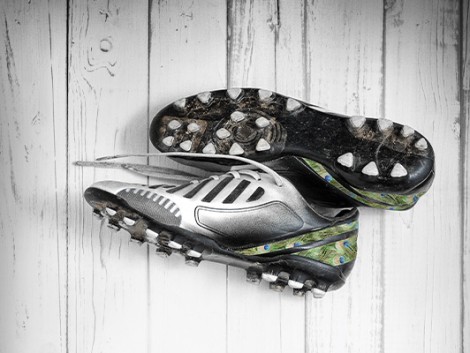 football boots hanging wall