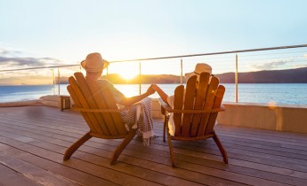 Couple sitting in the sun