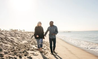 Senior men and senior women on the beach