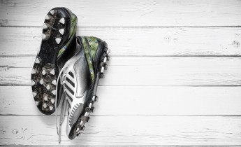 football boots hanging wall